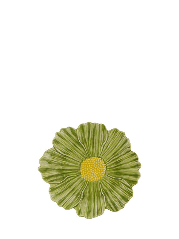 A green floral-patterned earthenware serving plate with a yellow center.