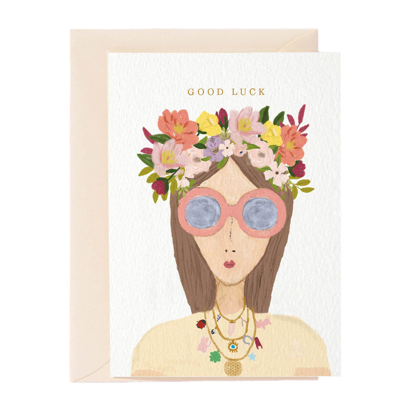 Greeting card with illustration of a woman wearing sunglasses and a floral headband, with 'Good Luck' text.