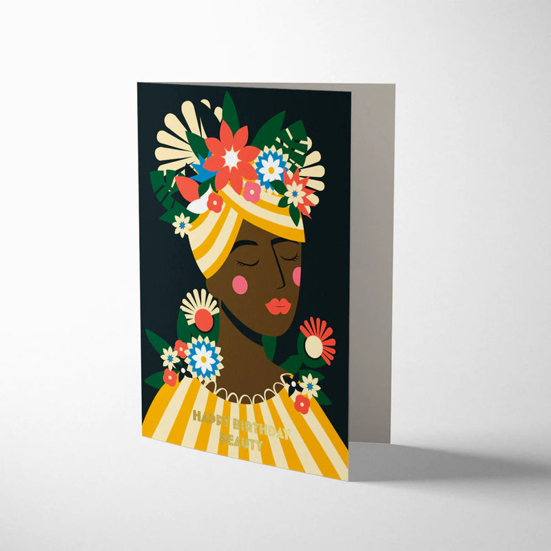 Greeting card with a colorful illustration of a woman wearing a floral headpiece on a white background