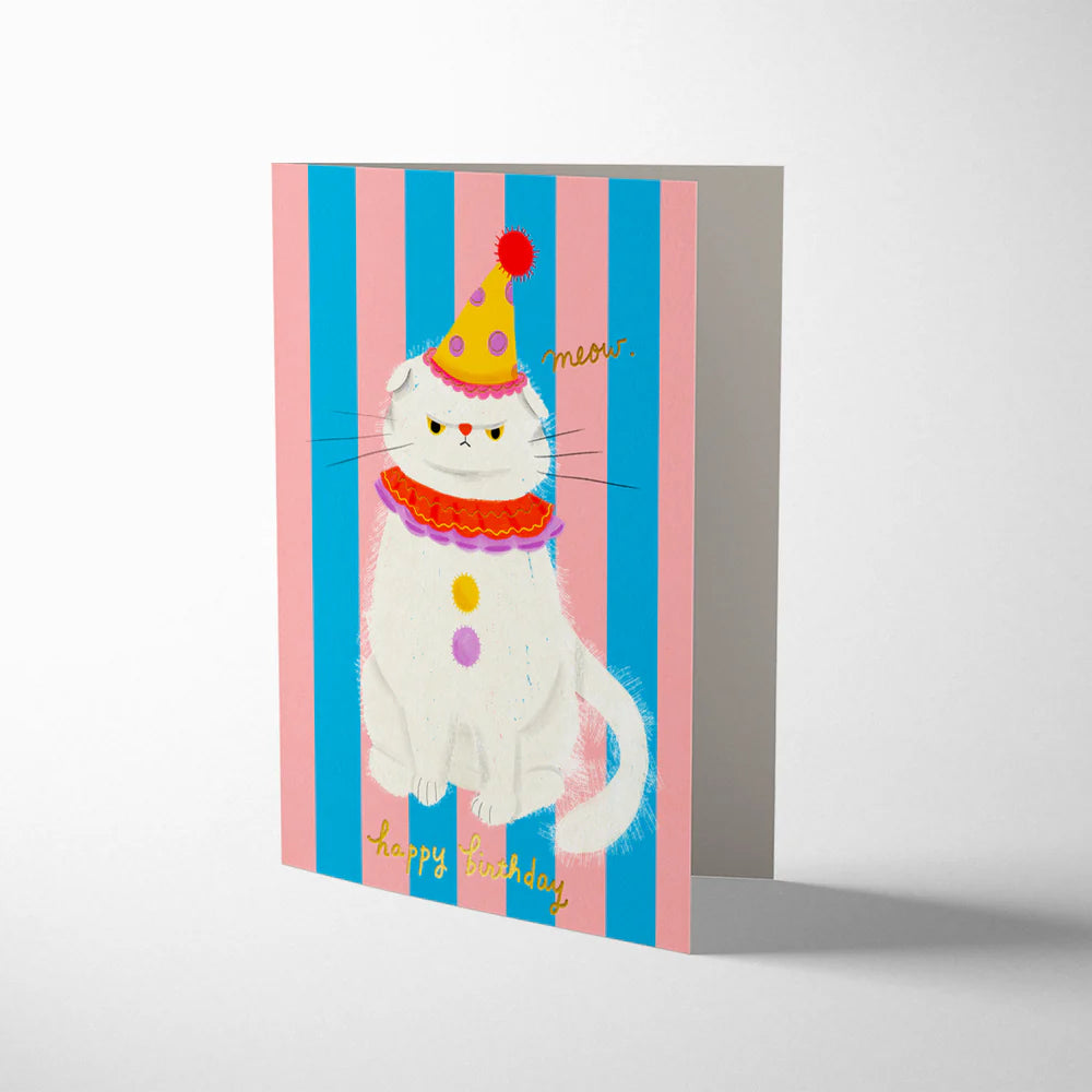 Greeting card with a cat wearing a party hat on a striped background