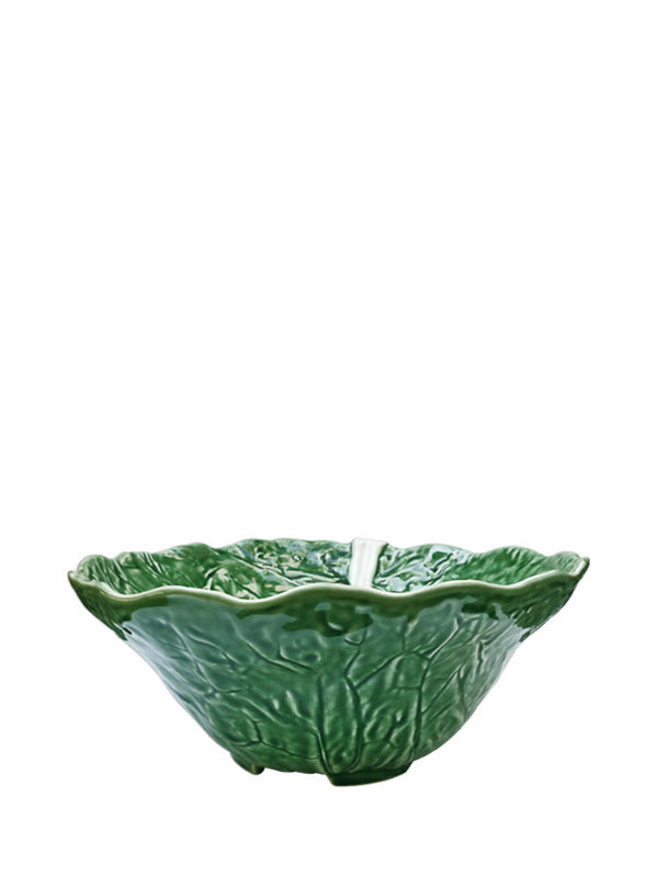 A green ceramic salad bowl with a leaf pattern, likely a product of Portuguese design.