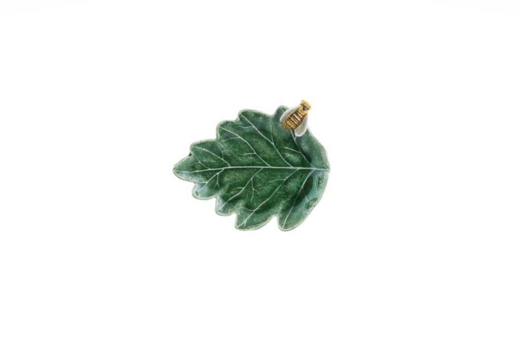 Oak tree leaf with bee