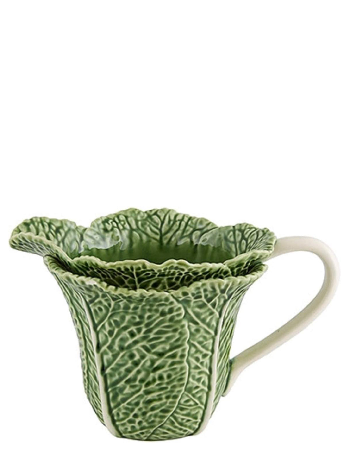 A green earthenware pitcher designed to resemble a cabbage leaf.