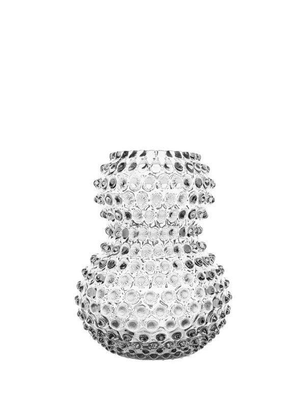 Decorative glass vase with embedded crystals on a white background