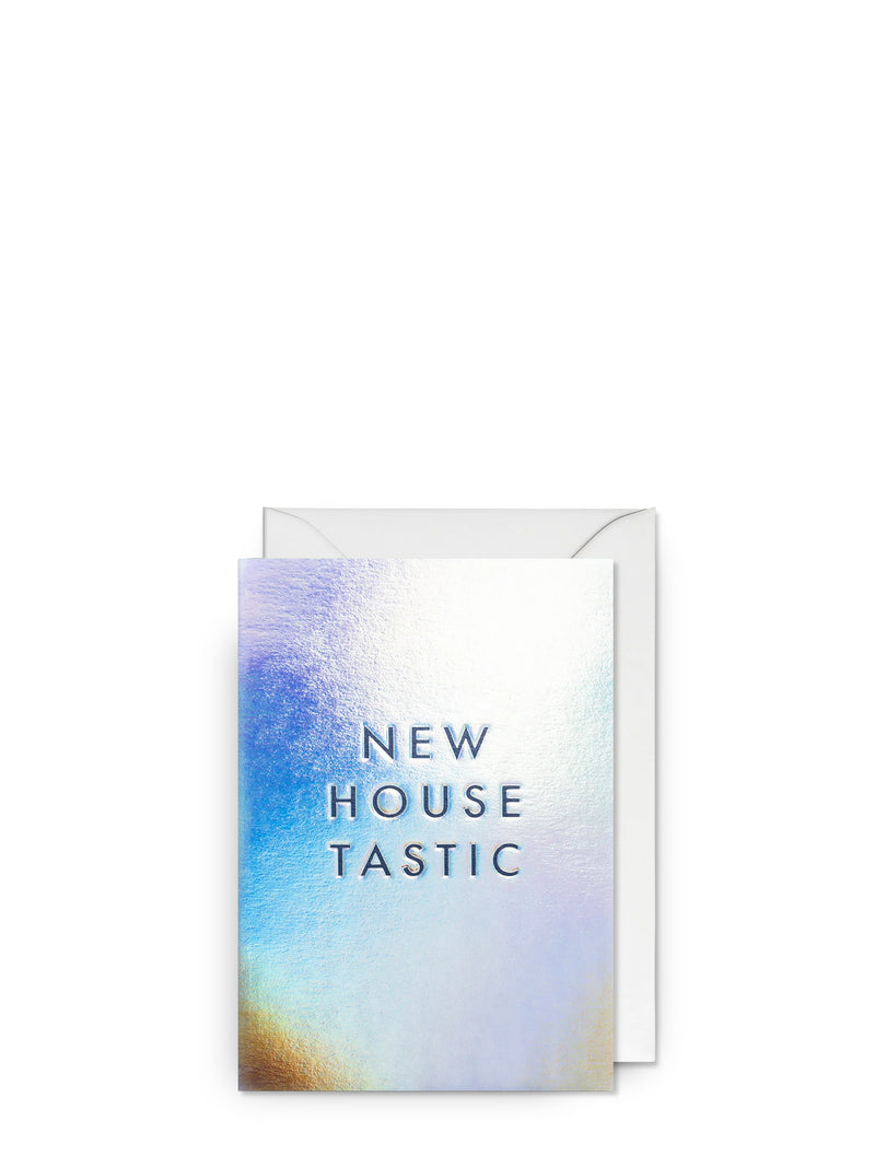 Greeting card with 'New House Tastic' text on a gradient background