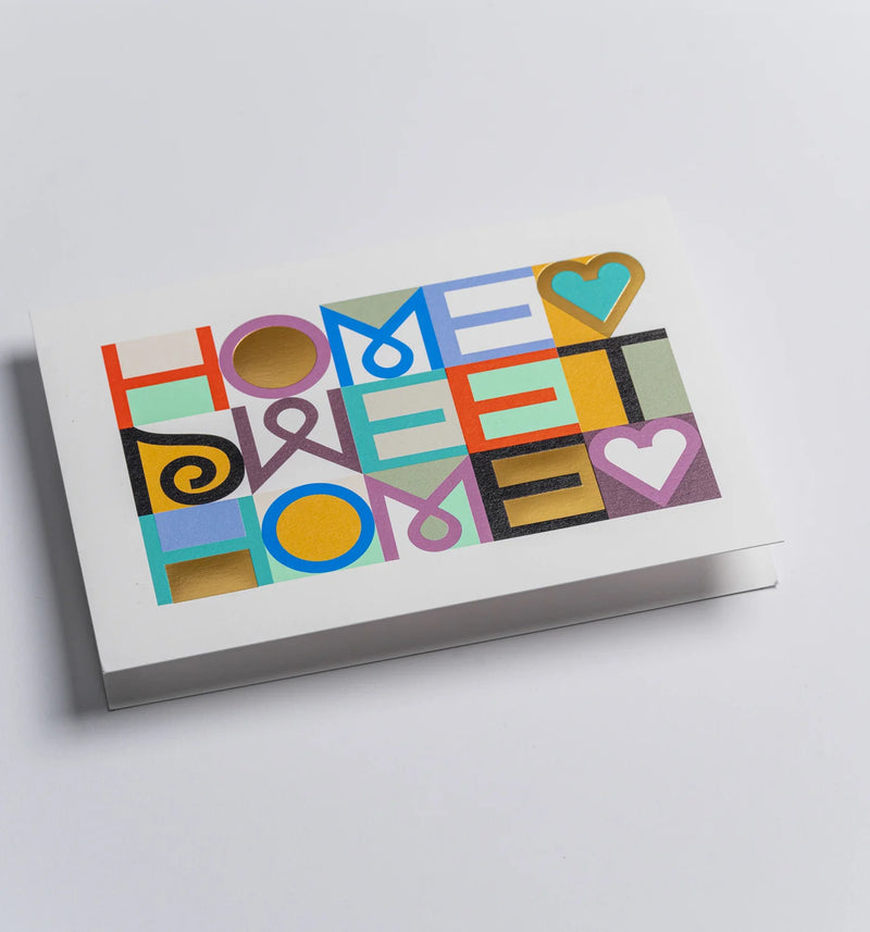 Colorful 'Home Sweet Home' card on a white background