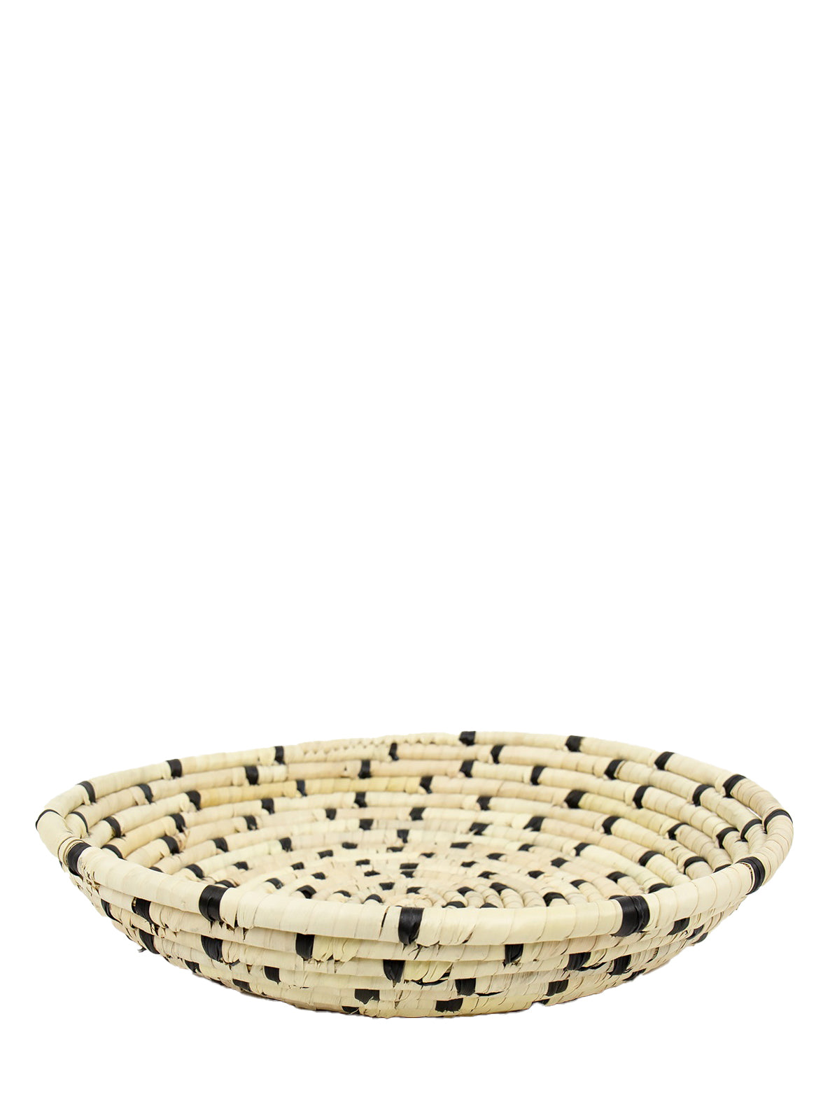A woven palm leaf basket in natural and gray colors with a solid pattern and dotted design.