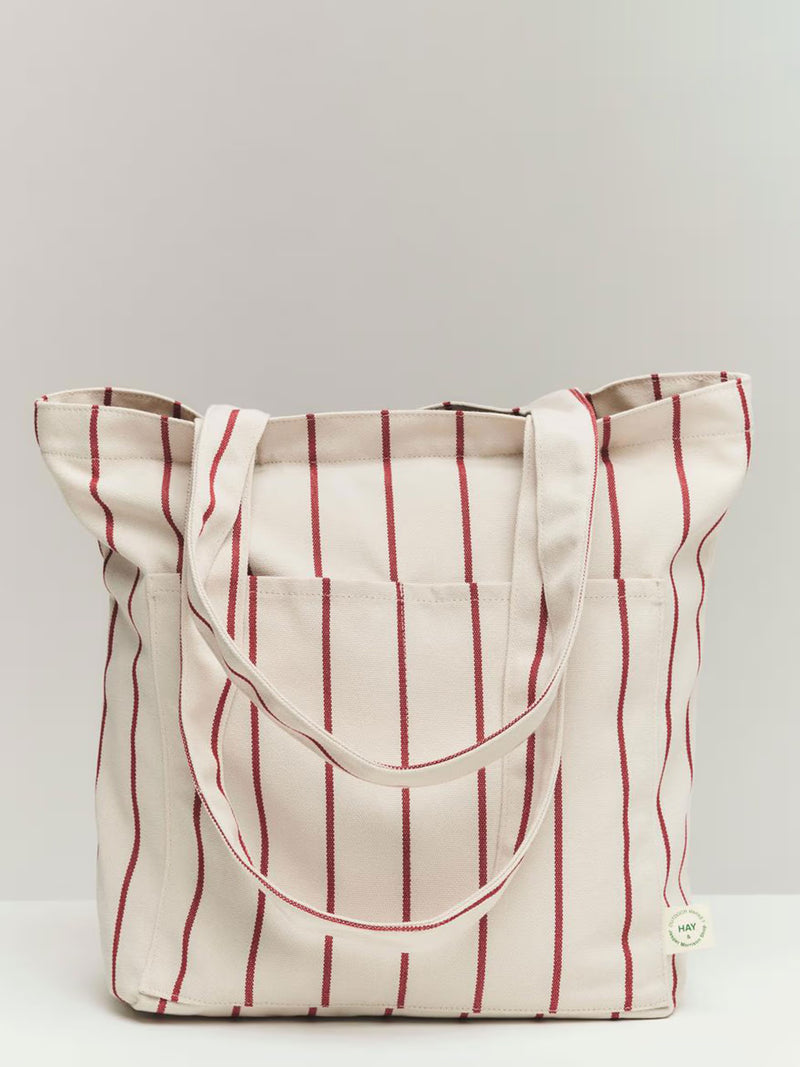 Tote bag with red vertical stripes on a white background