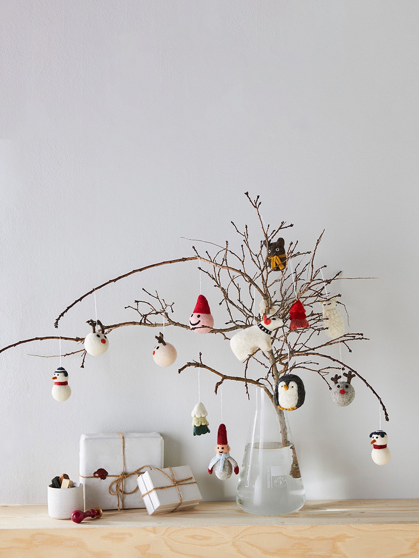 Smiley Santa woollen hanging ornament, red hat