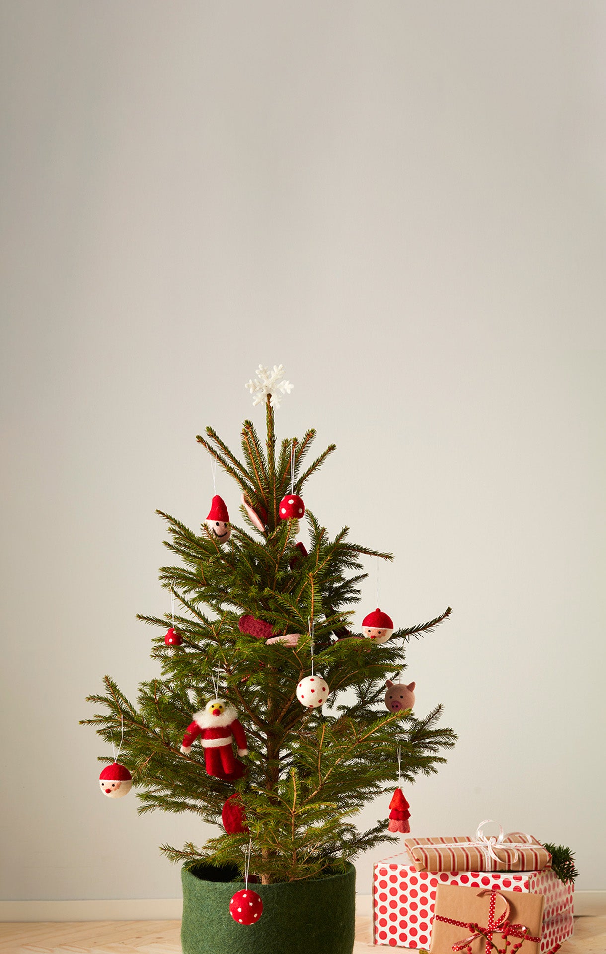 Smiley Santa woollen hanging ornament, red hat