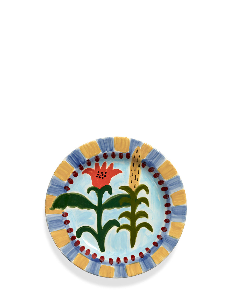 Decorative plate with floral design on a white background