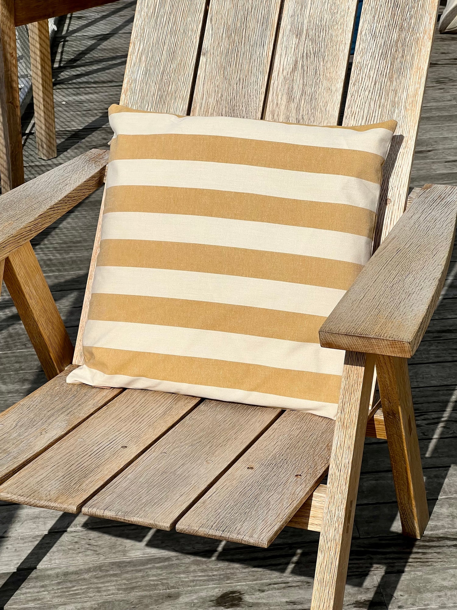 Strand outdoor cushion, warm yellow/parchment