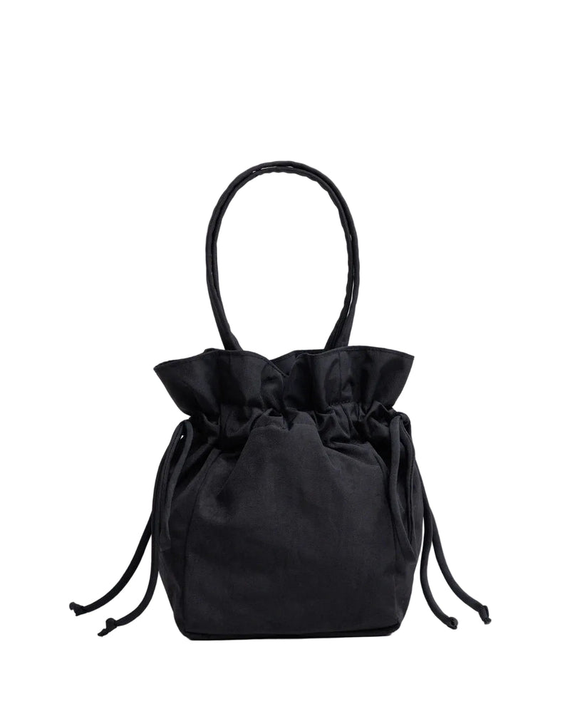 Black drawstring bag on a light gray background