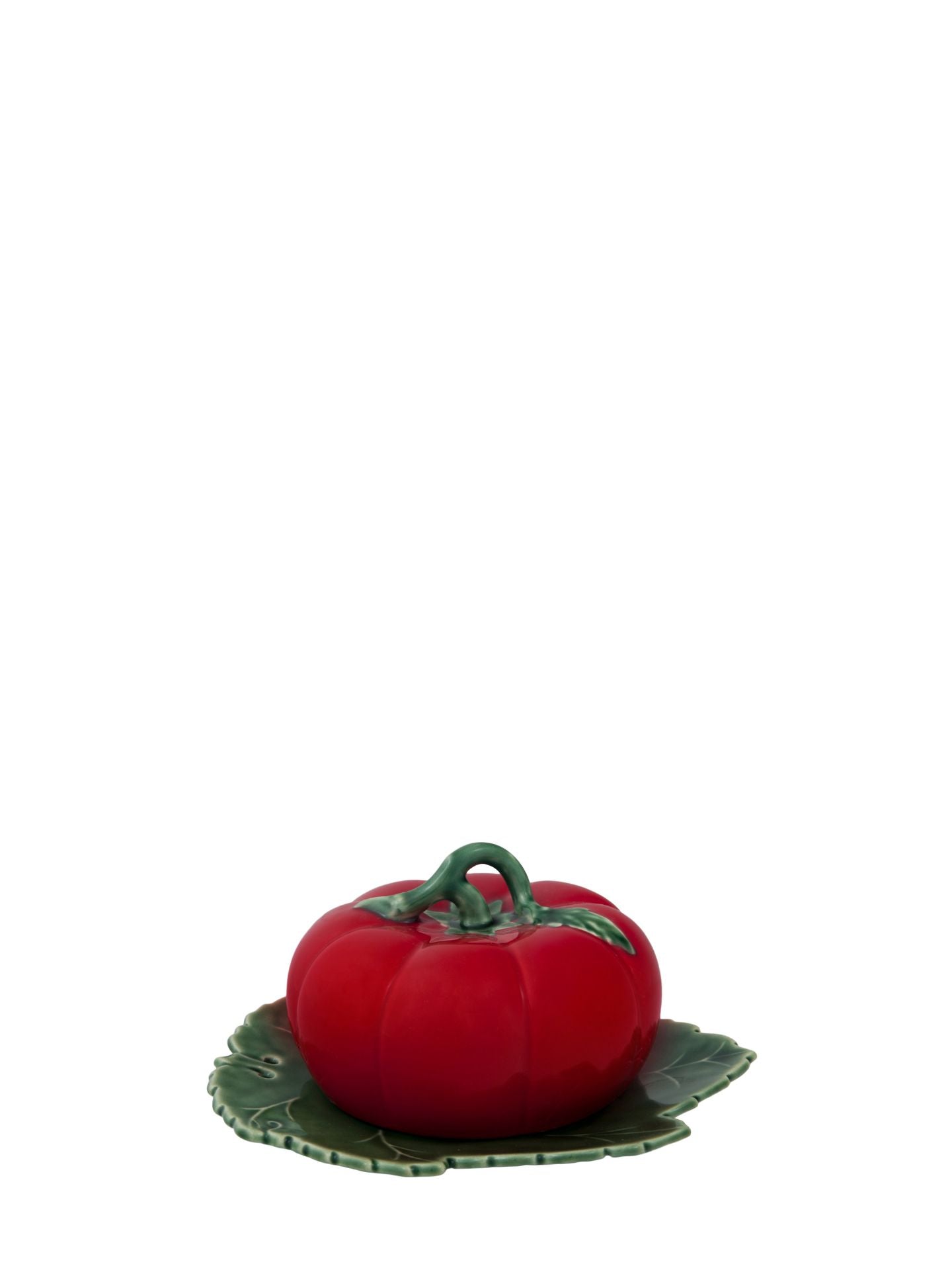 Red tomato-shaped soap on a white background