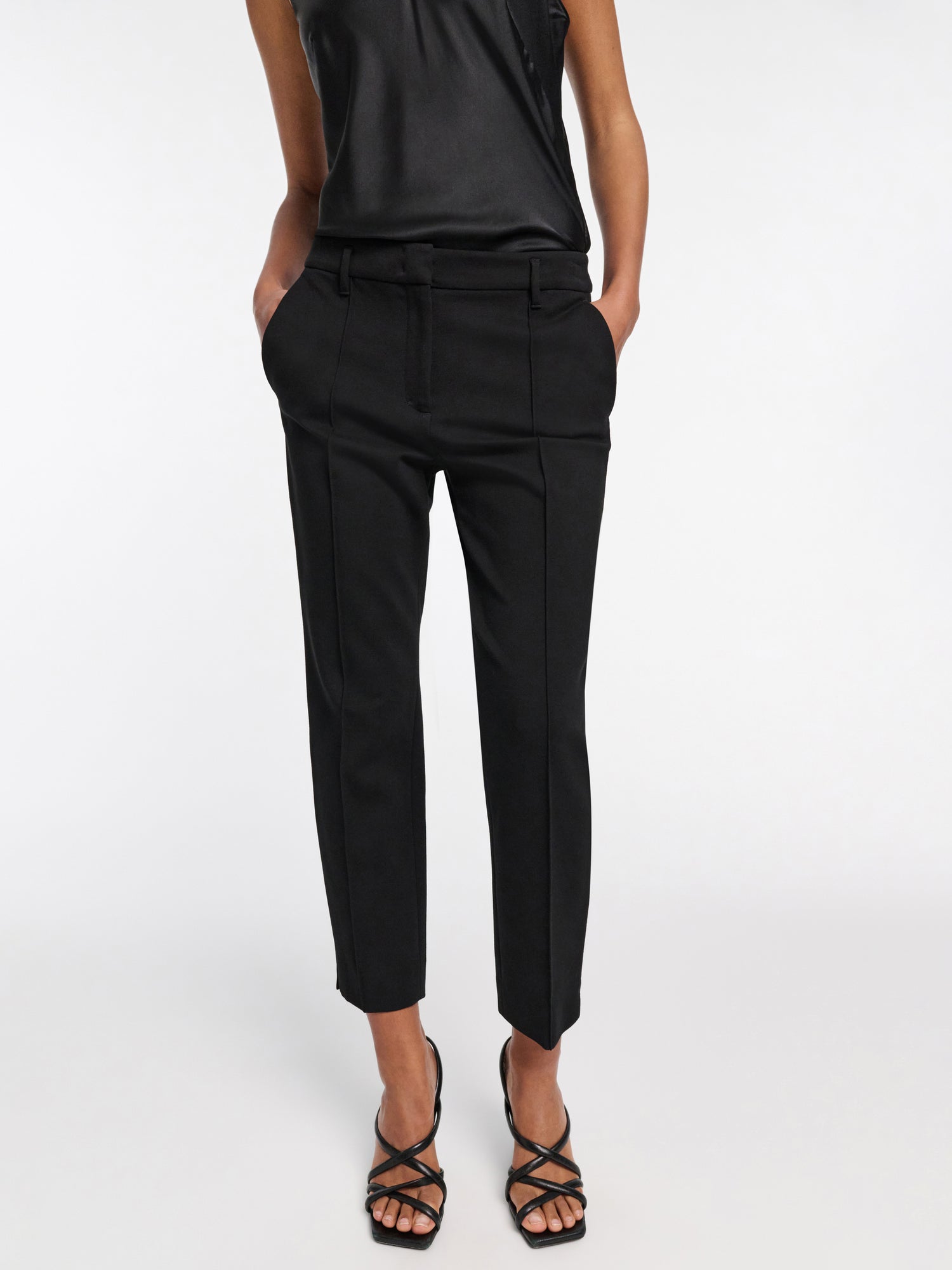 Tapered-leg trousers in Punto Milano, black