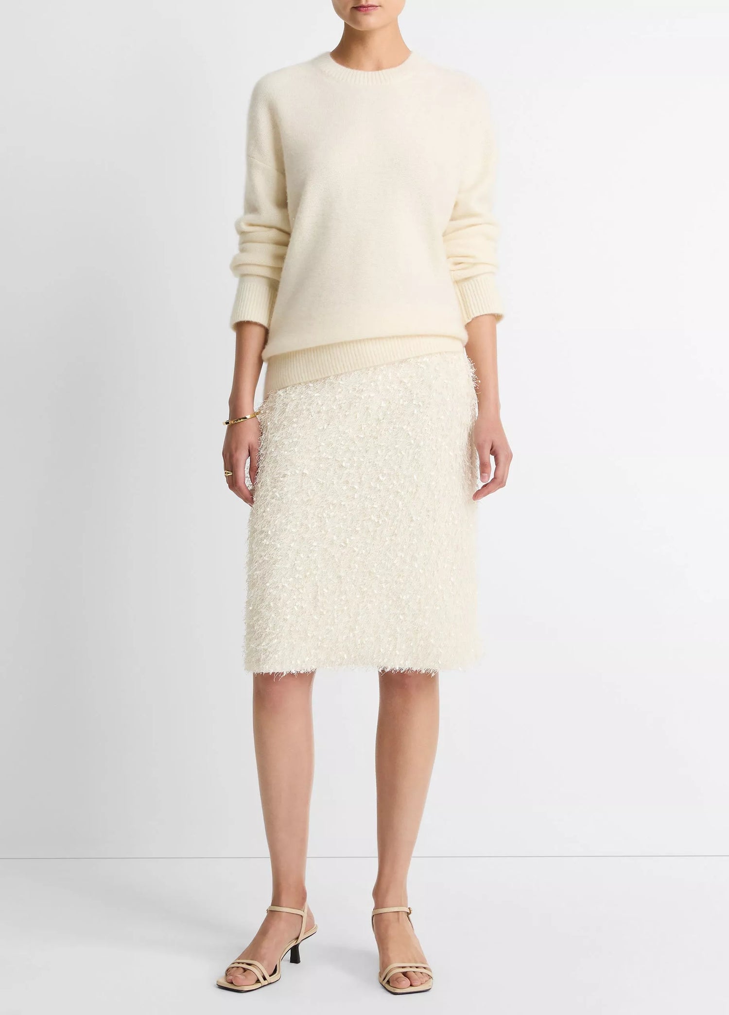Feathery fringe above knee skirt, cream