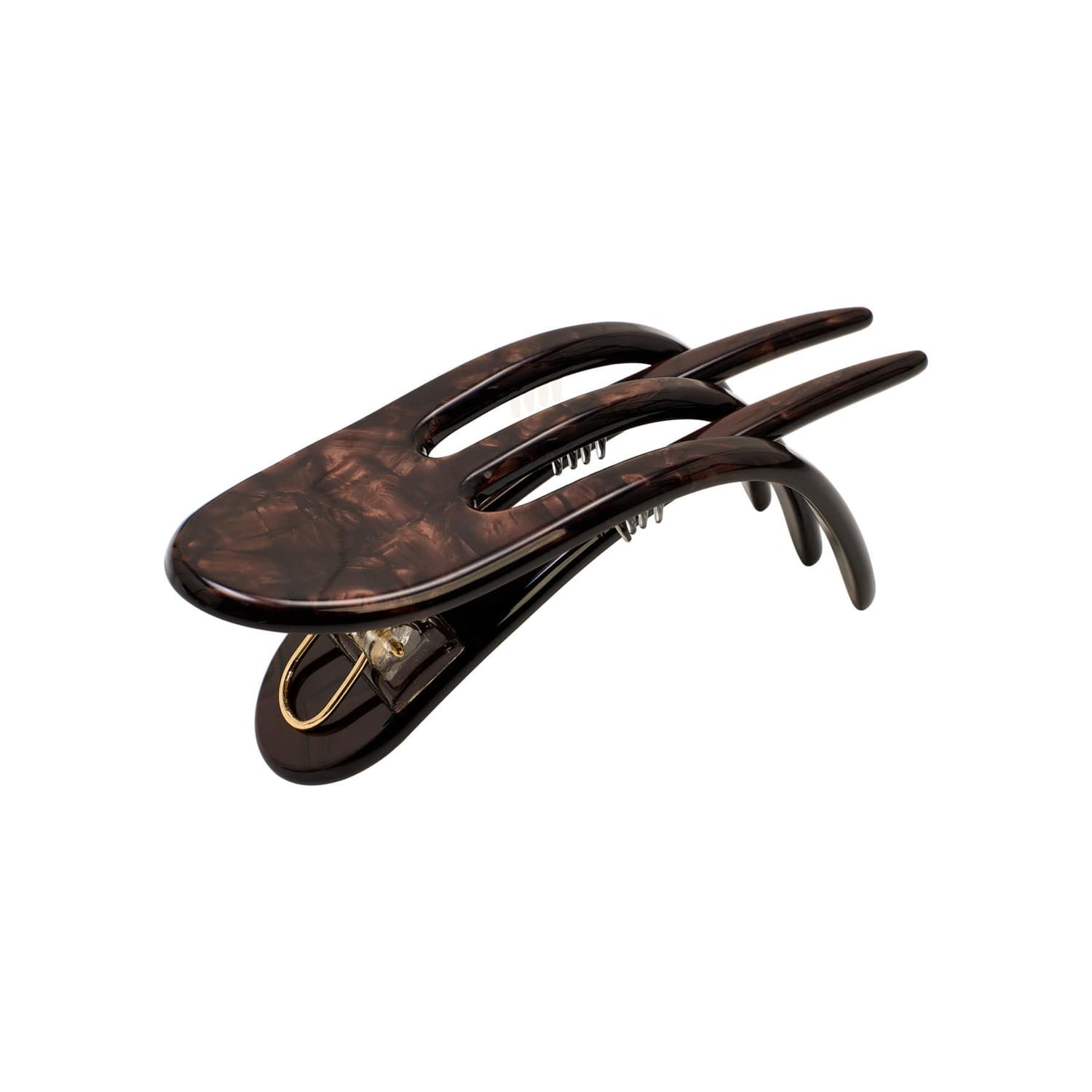 Brown tortoiseshell hair clip on a white background