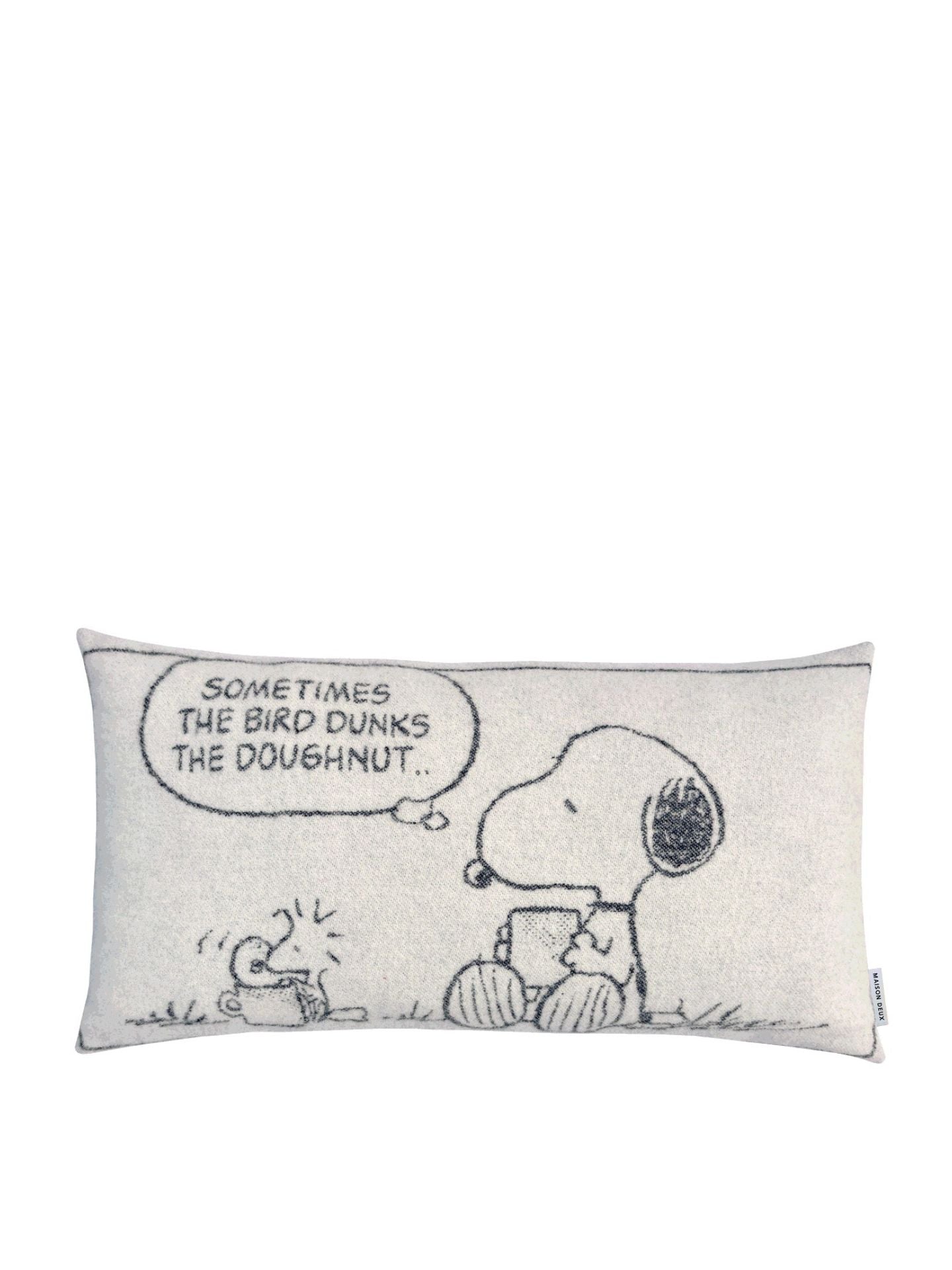 Decorative pillow with cartoon design of a dog and bird, featuring text 'Sometimes the bird dunks the doughnut'.