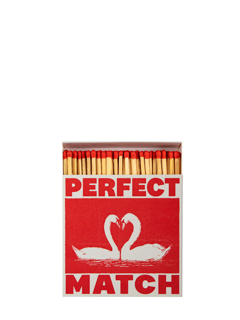 Matchbox with 'Perfect Match' text and swan design on a white background