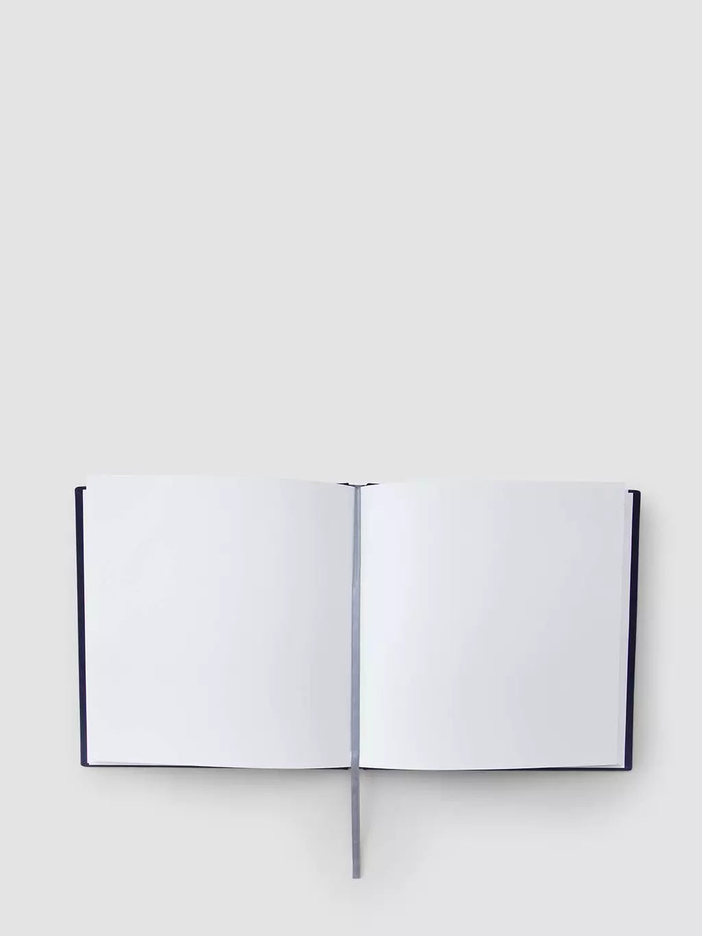 The guestbook has blank pages for guests to write, draw or map out their messages.