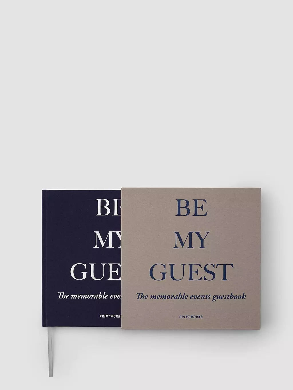 Navy guestbook with beige cover has a more sombre, grown-up mood.