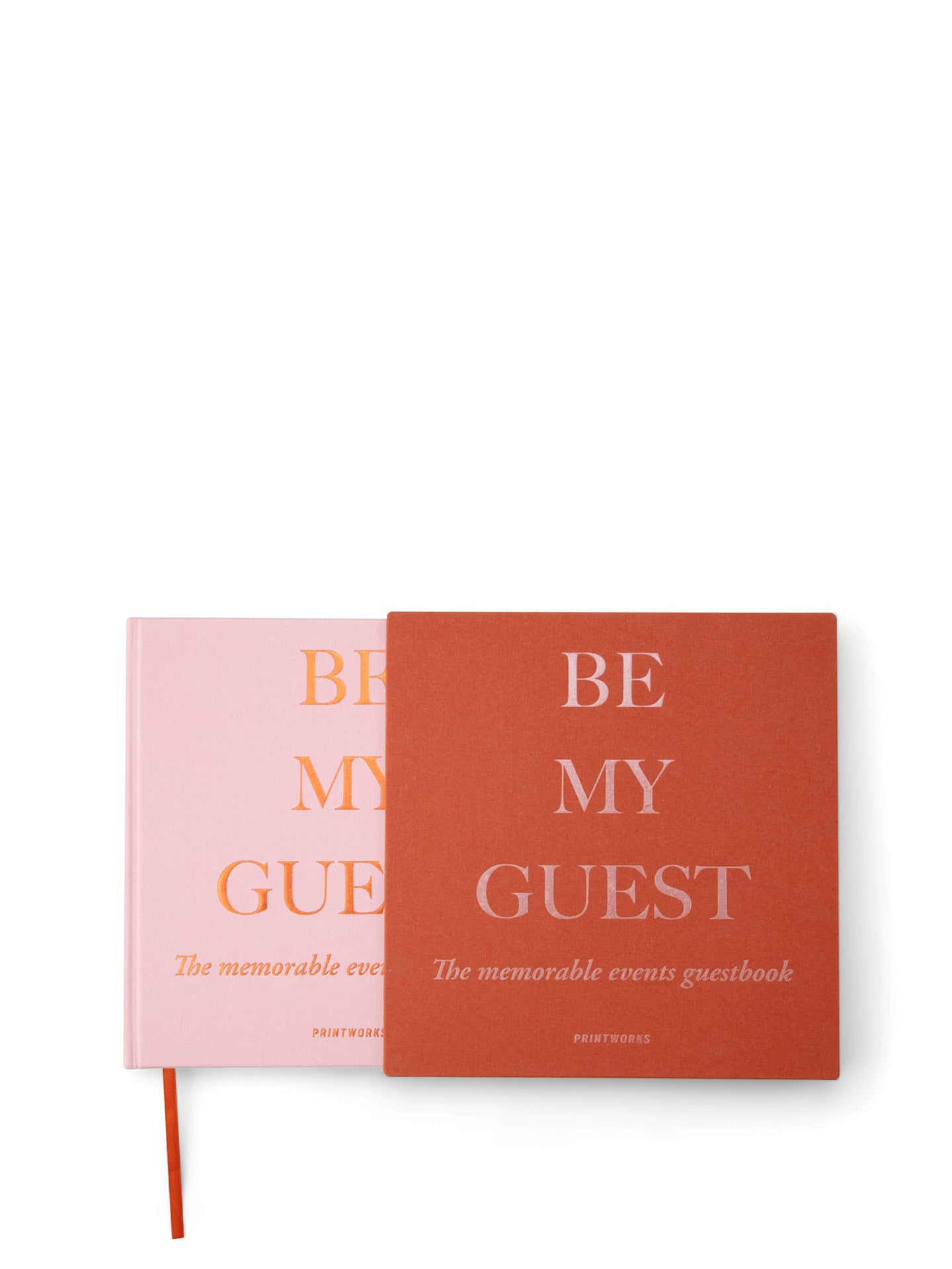The light pink guestbook with its beautiful rust hued cover.