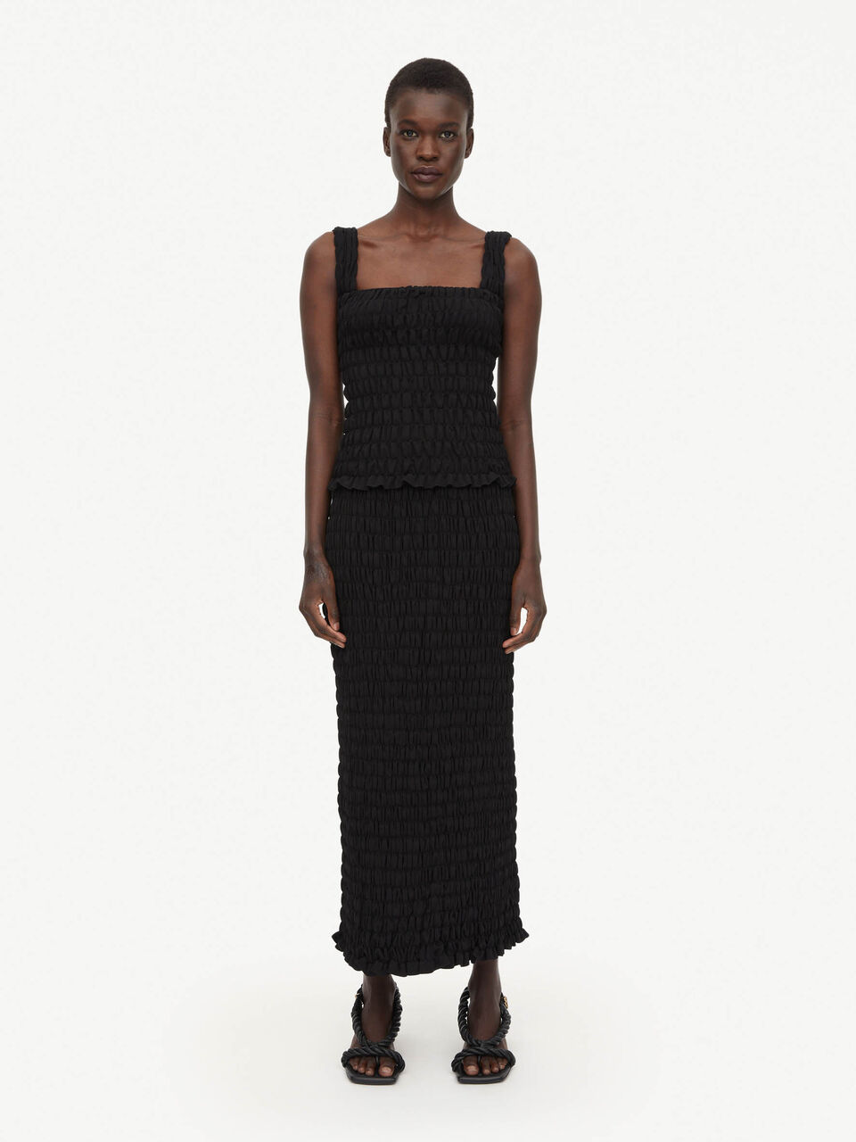 Malene Birger: EMLA shirred maxi skirt, black. Sold by My o My Helsinki.