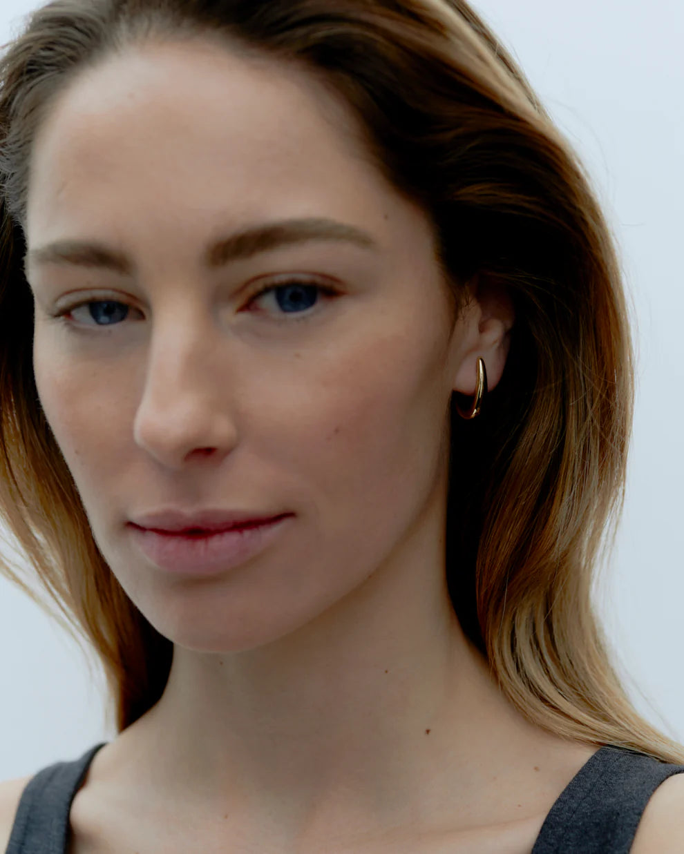 Dualism Sculptural earrings, gold plated