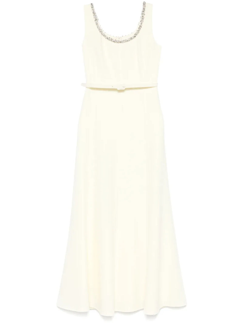 Light yellow dress with a pearl neckline on a white background