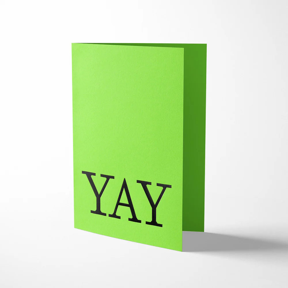 Green greeting card with 'YAY' text on a white background