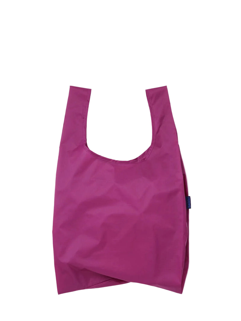 Purple reusable shopping bag on a white background