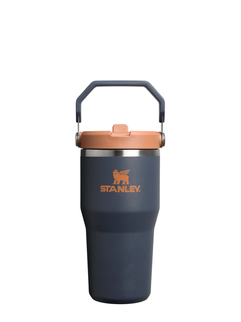 Blue Stanley tumbler with a copper lid on a white background