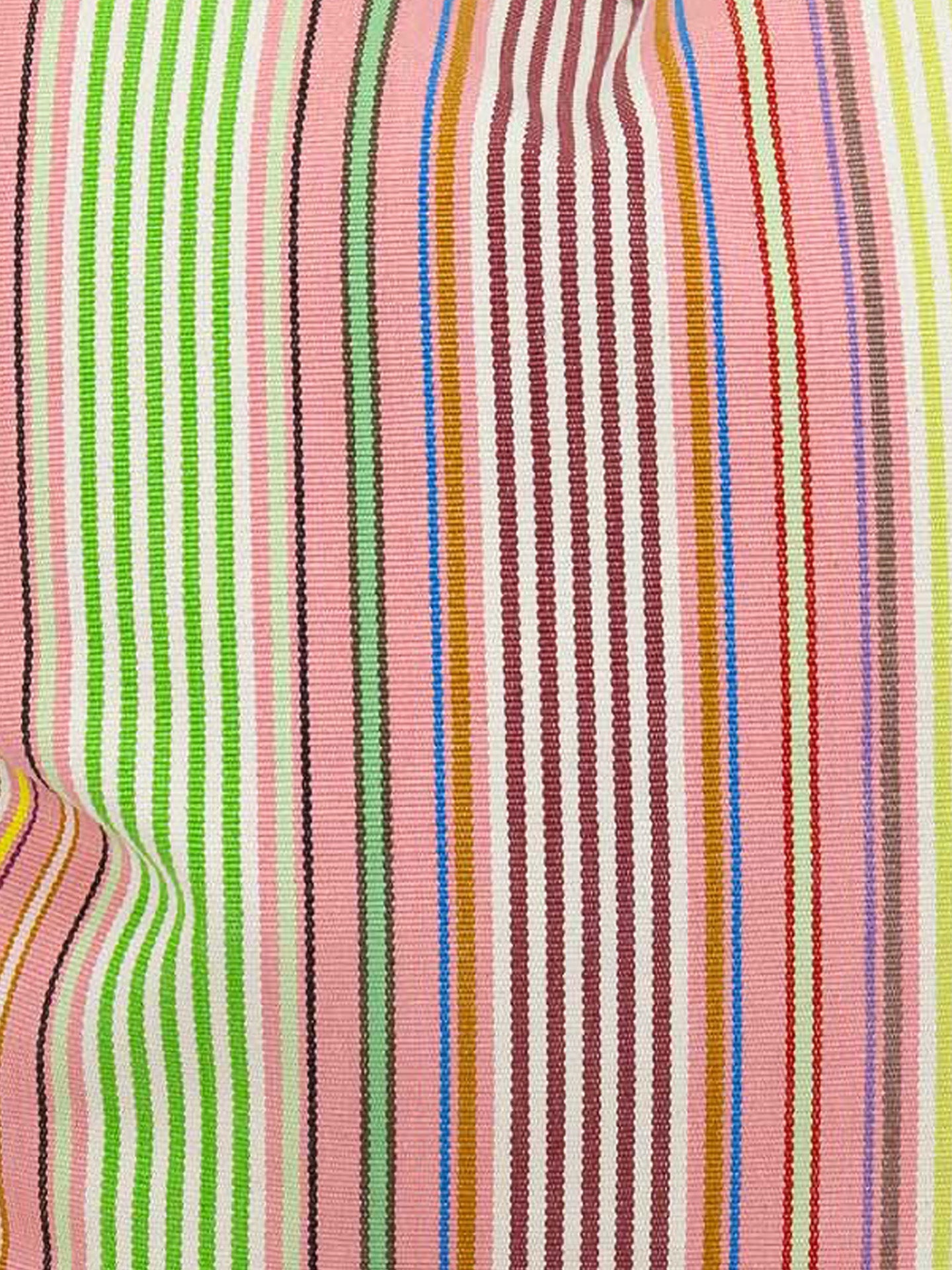 Close-up of colorful striped fabric with pink, green, blue, and orange lines.