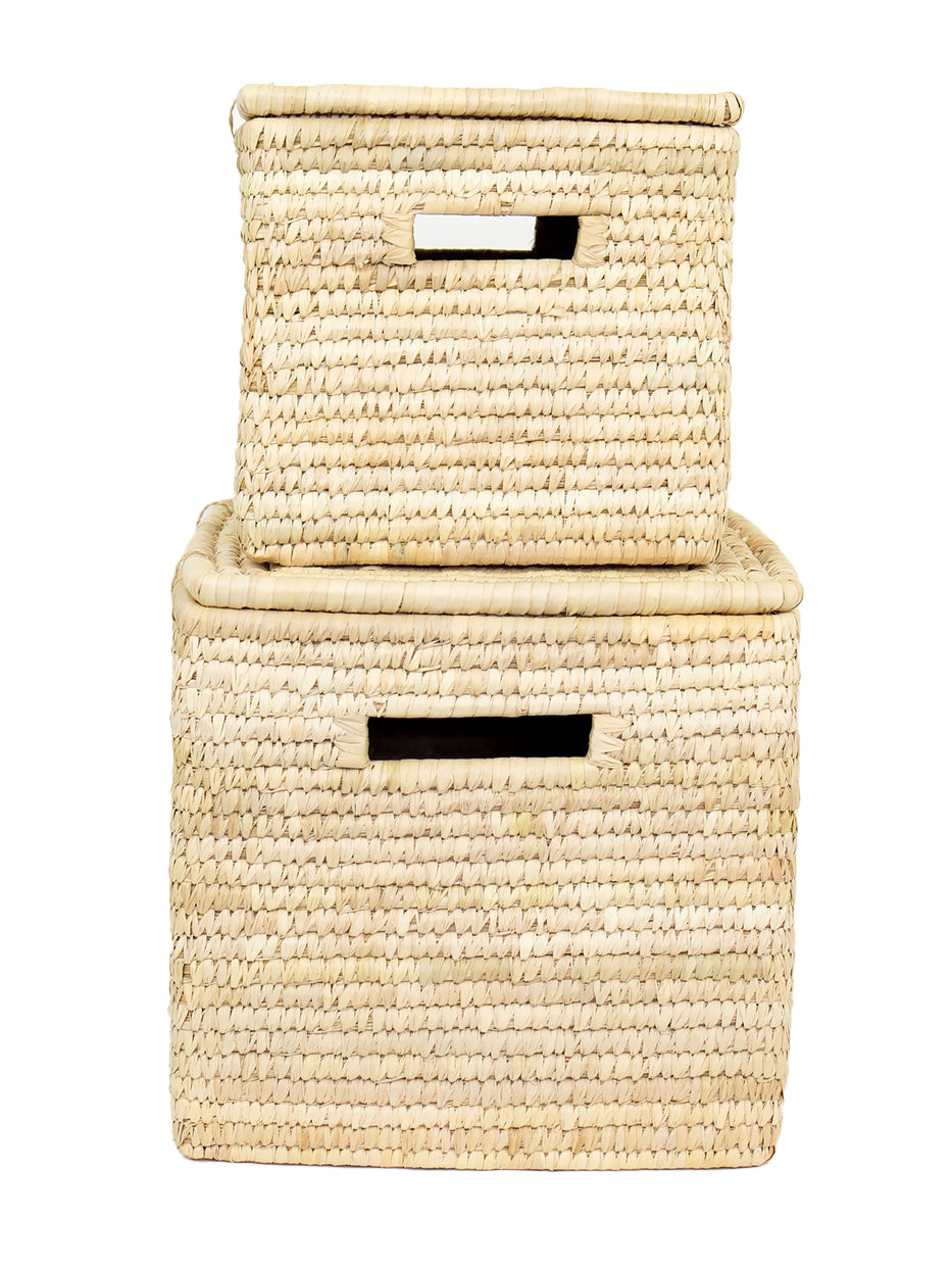 A small, beige palm basket with a lid, handcrafted from natural materials.