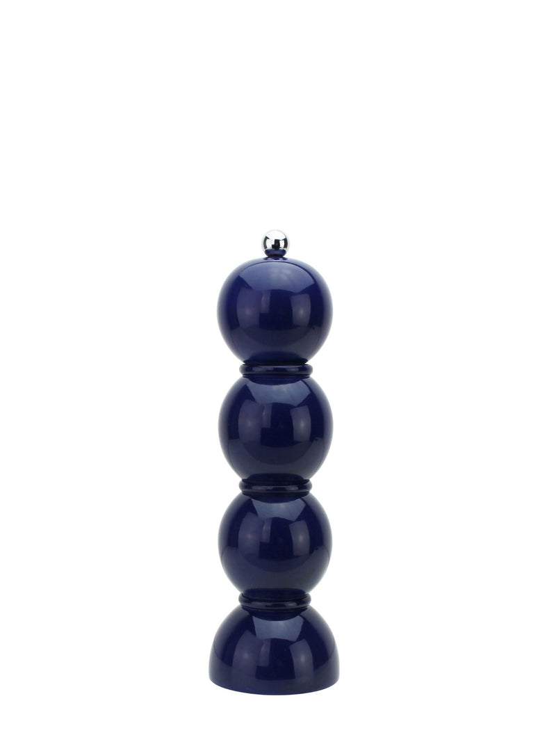 Navy blue ceramic pepper grinder on a white background