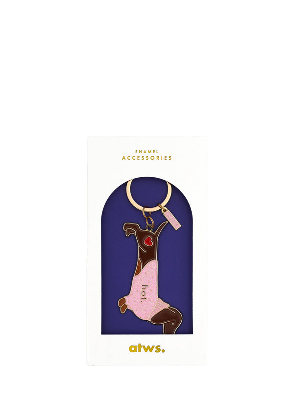 Enamel accessories keychain on a blue card with 'ahws.' branding