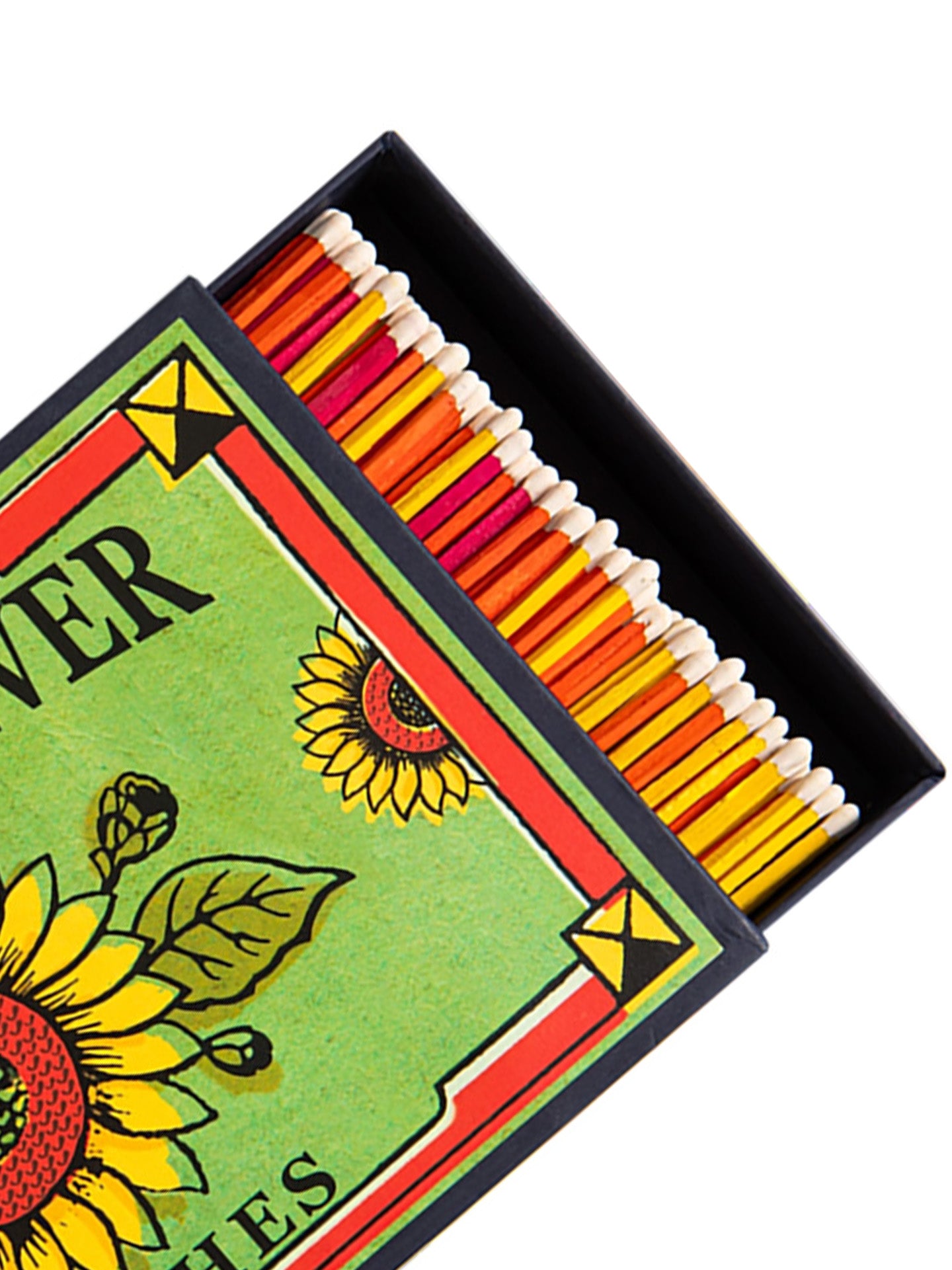 A close-up of a decorative matchbox with a sunflower illustration and the partial text 'FLOWER' visible on the lid. Several matches are pulled out from the black interior, showing yellow, orange, red, and pink match heads against white tips.
