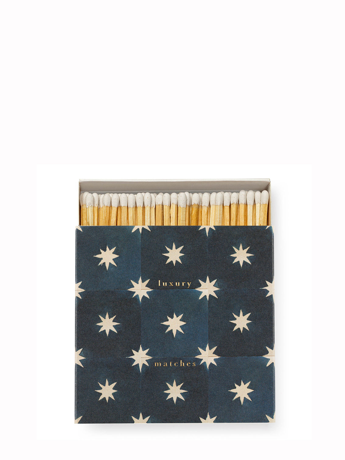 A navy matchbox with a star pattern design.