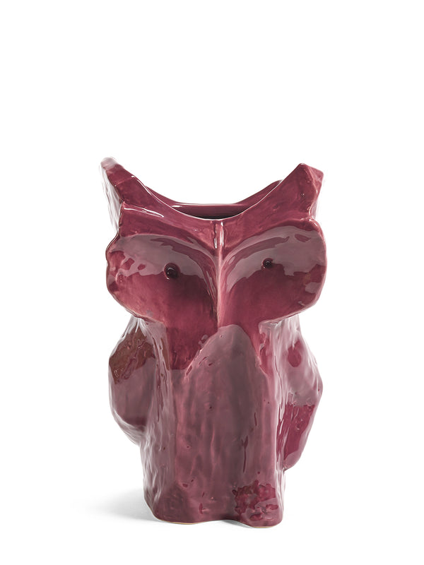 Purple ceramic owl-shaped vase on a white background