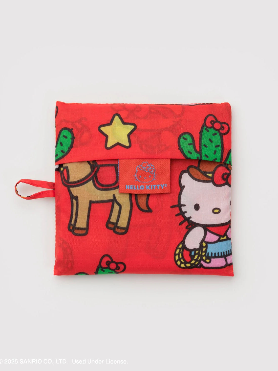 Red pouch with Hello Kitty design featuring a horse and cactus on a white background