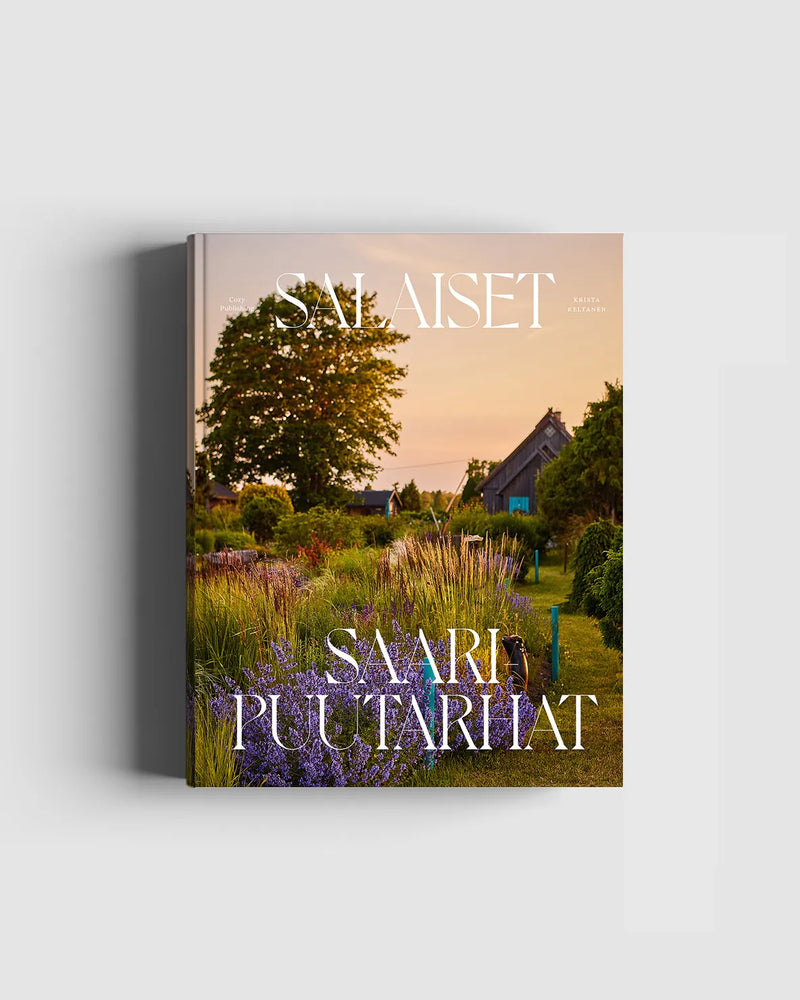 Book cover with a scenic landscape and text "Salaiset Saaripuutarhat" on a white background