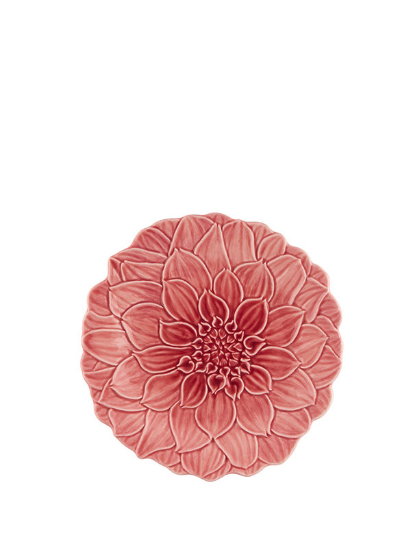 A round, earthenware Dahlia plate with a raised floral pattern in a pink hue.