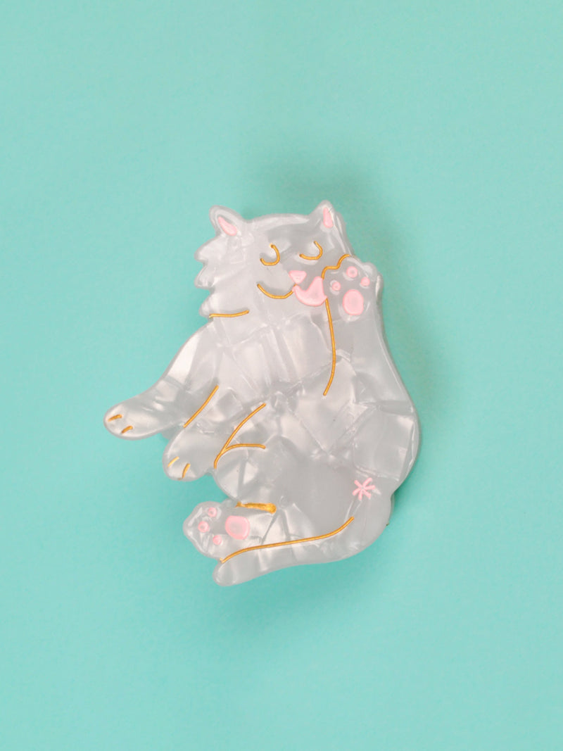 White cat hair claw