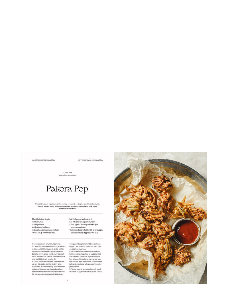 A printed recipe page titled 'Pakora Pop' shown beside a food photograph of golden fried pakora pieces on parchment paper with a small bowl of red dipping sauce.