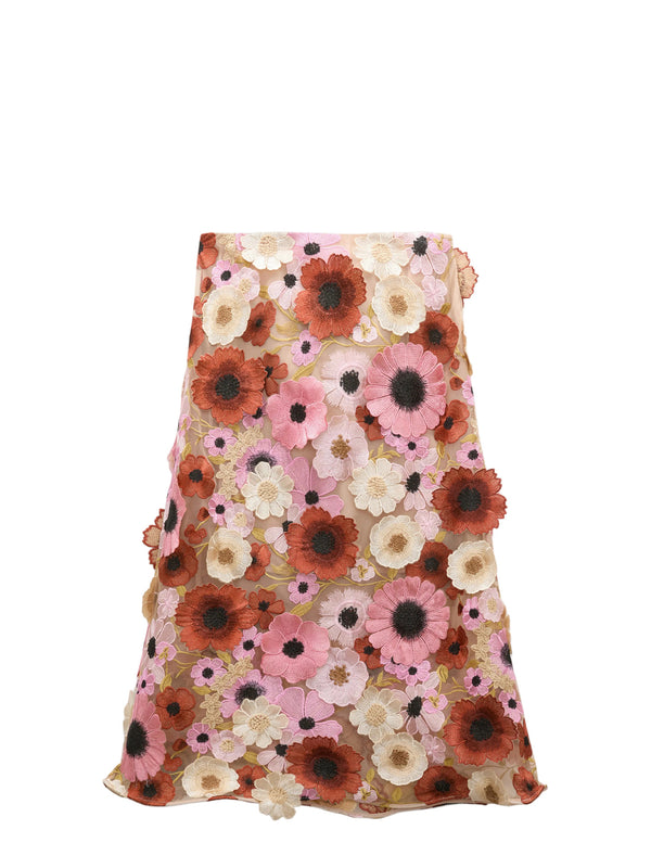 Floral skirt with a mix of pink, orange, and white flowers on a white background
