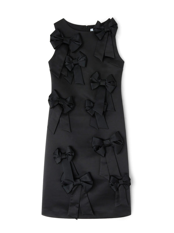Black dress with bow details on a white background