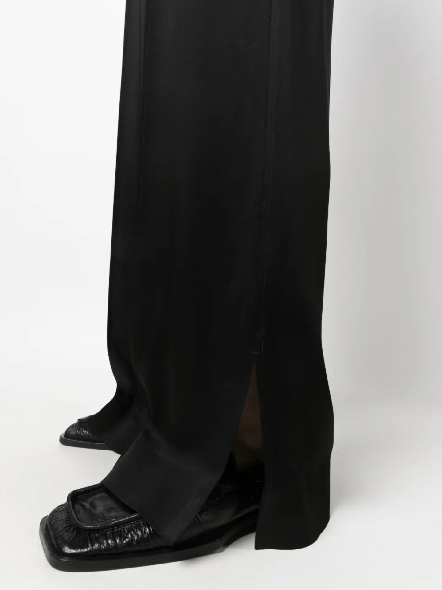 Black pants and shoes on a white background