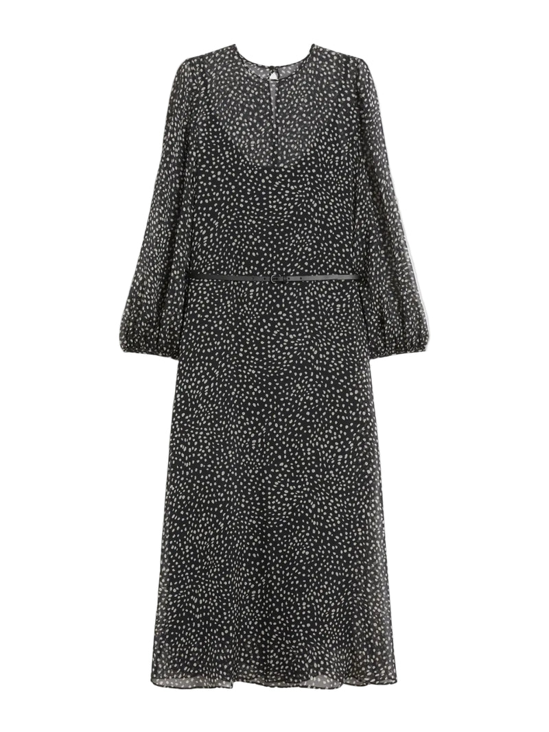 Black and white polka dot dress on a white background