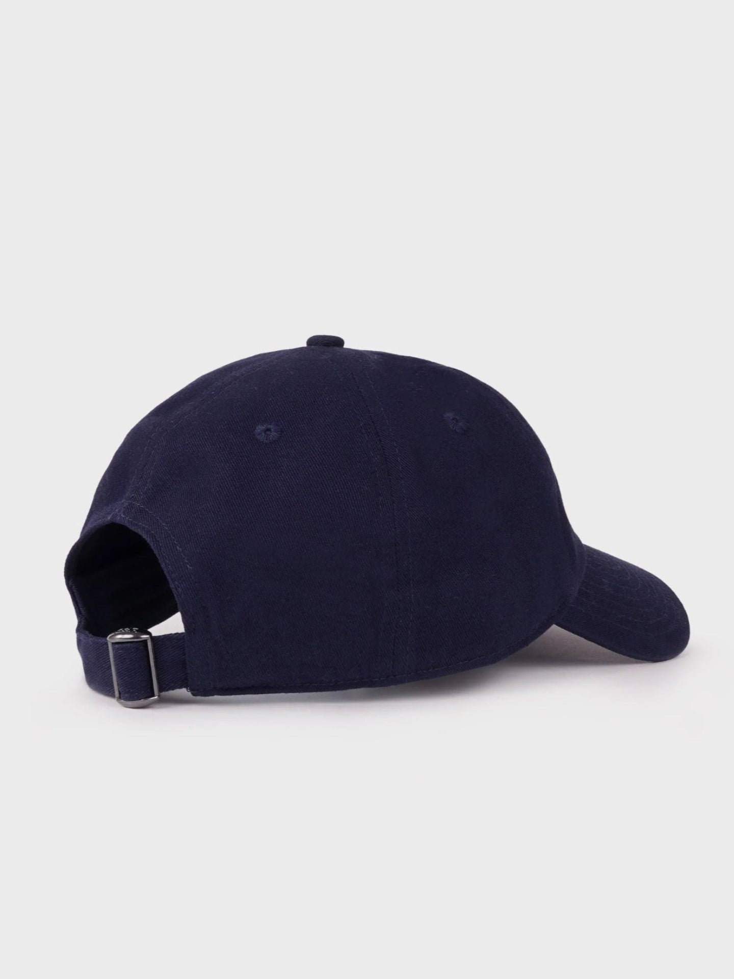 Navy blue baseball cap on a light gray background