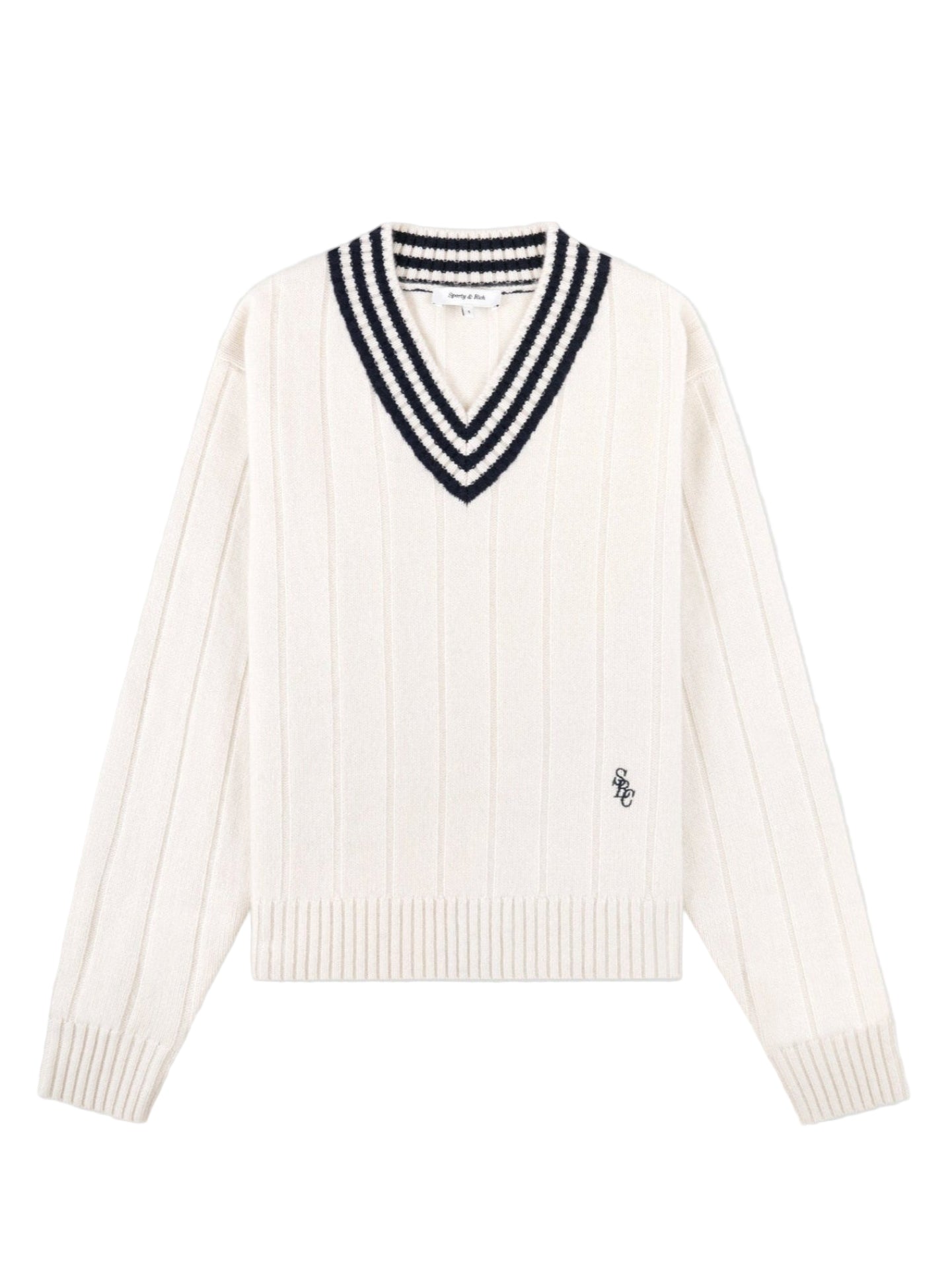 Cream cashmere sweater with navy stripes and cable knit against white background